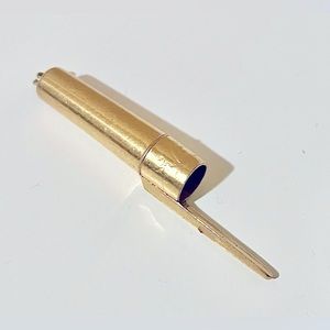 Tobias Wong gold coke spoon bic pen cap
